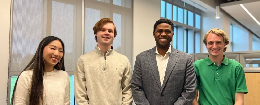 image of Cullen Merritt with his research lab students